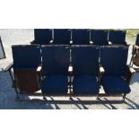 Run of four Kalee cast iron framed Cinema seats with curved backs and lift-up seats, L235cm D43cm