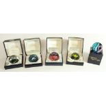 Five Caithness glass paperweights incl. 1st Quarter, Stardust, Dawn/Dusk, Flower in the Rain and