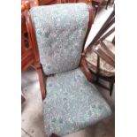 Victorian oak framed nursing chair, upholstered in William Morris pattern fabric on turned supports,