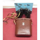 Carl Zeiss Jena 10x50W Jenoptem binoculars, complete with original brown leather case, outer