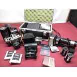 Collection of camera accessories including Metz 45-4 hammerhead flashgun, with various