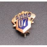 14k gold and enamel American High School badge stamped 14k