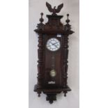 Early C20th continental walnut cased Vienna style wall clock, pediment crested with eagle and turned