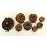 Selection of eight vintage wooden reels of various sizes