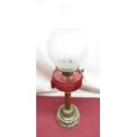 Late C19th oil lamp with frosted and etched shade, cylindrical cranberry faceted reservoir on rope
