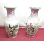 Two oriental vases, on adorned with Peacocks, the other with a oriental party scene(approx. 47cm