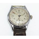 1960's Oris hand wound wristwatch with pointer date, silvered dial, set with Arabic numerals, minute