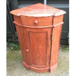 C20th Victorian style eastern hardwood corner cupboard, with reverse break front top over single