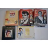 A collection of Elvis Presley memorabilia including an almost complete set of DeAgostini "Elvis-