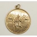 9ct yellow gold circular St. Christopher pendant, stamped 375, D3.2cm, 7.6g