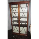 Early C20th mahogany display cabinet, full length astragal glazed doors enclosing five adjustable