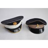 2 British Army caps with badges. One Royal Army Pay Corps officers cap (Tower Clothiers Ltd), size 7