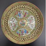 C20th Canton circular plate, famille verte and rose enamelled with alternating panels of figures and