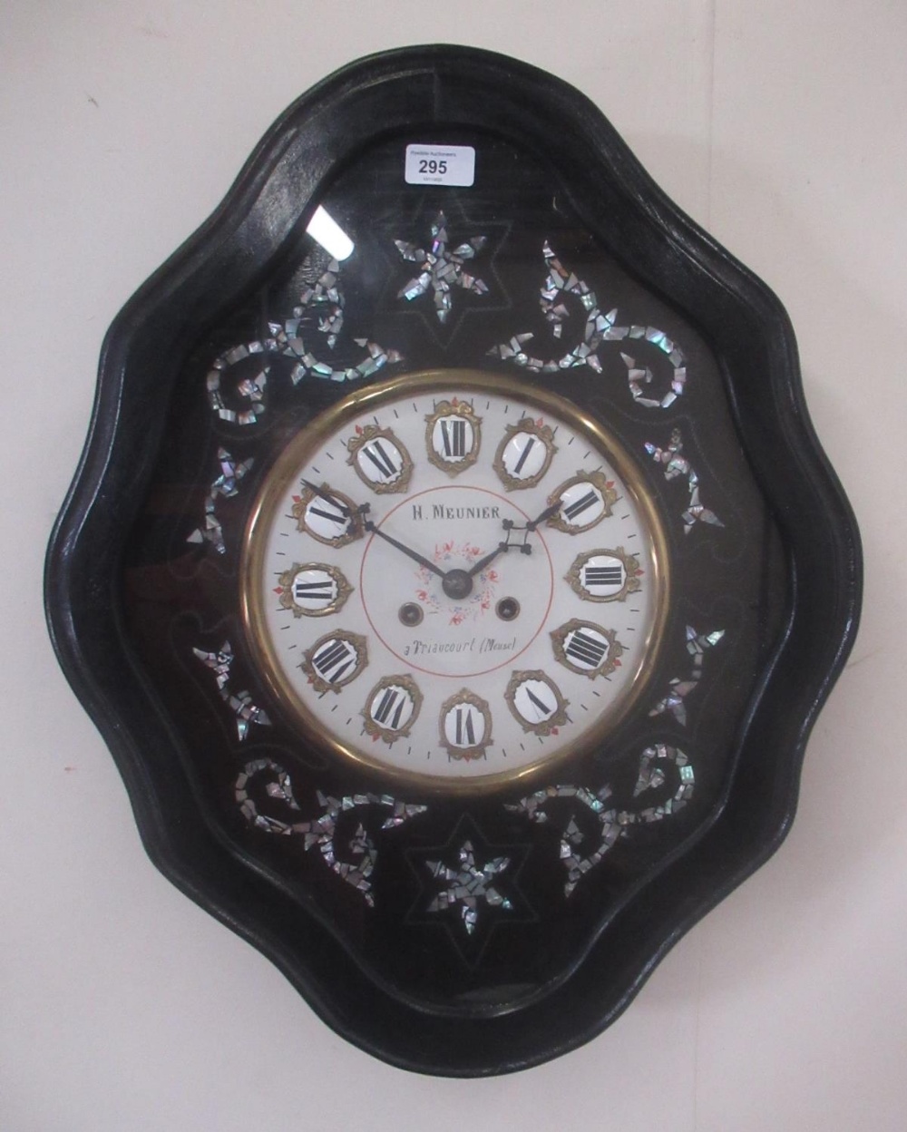Late C19th French ebonised vineyard clock, shaped and moulded case, the bezel surround inset with