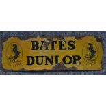 An enameled steel plate advertising sign for Bates Dunlop. W59.7xH20.2cm