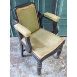 C20th lack painted vintage Barbers type chair with adjustable back, on turned supports, W61cm