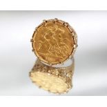 Geo.V 1912 gold half-sovereign ring in 9ct gold scroll mount, stamped 375, size K1/2, 9.3g