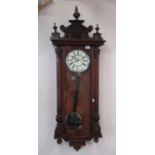 Gustav Becker C20th walnut cased Vienna wall clock, architectural pediment with turned finials, full