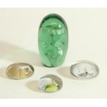 C19th End of Day green glass dump paperweight with foil flower inclusion, and three Edwardian