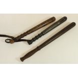 Three vintage turned wooden police truncheons, L47cm max