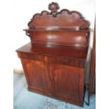 Victorian mahogany Chiffonier, with scroll carved raised back above two drawers and two doors, on