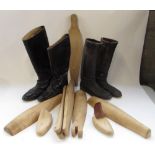Pair of black leather riding boots, size 12, a similar smaller pair and two pairs of wooden boot