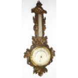 Victorian Black Forest type oak banjo aneroid barometer and thermometer, silvered circular dial with