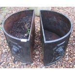 Pair of half moon cast iron planters with lion motif, 79cm x 26cm x 30cm