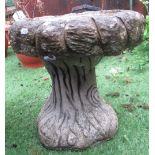 Small, reconstituted stone birdbath in the shape of a tree stump, H36cm W36cm
