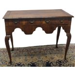 C18th style herring banded walnut side table, moulded top with two frieze drawers and shaped apron