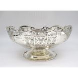 ER.11 hallmarked silver circular pedestal bowl, pierced in Victorian style with trellis and leafage,