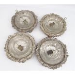 The Grange Goathland - Set of four facet cut shell shaped glass salts in circular silver plated