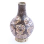 Martin Brothers stoneware Art Pottery bottle shaped vase, decorated in a repeating flower head