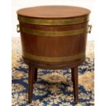 Geo. III brass banded coopered mahogany oval wine cooler, with hinged top and two brass carry