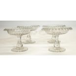 Set of four Georgian style glass Tazza, folded rim decorated with ovals, baluster stems with star