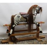 Quality craftsman made swing rocking horse, in dappled grey with associated tack and accessories,