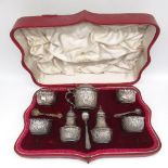 The Grange Goathland - Victorian hallmarked silver six piece cruet set, repousse decorated with