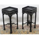 Pair of Chippendale style ebonised jardiniere stands, pierced galleries and friezes on cluster