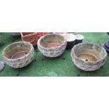 Set of three reconstituted stone circular planters with a wave style design, D50cm (3)