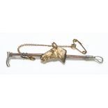 9ct yellow gold and silver hunting brooch as a horse's head and riding crop, stamped A.J.H 9c &