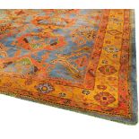 The Grange Goathland - Large blue ground Turkey carpet, traditional rust red and green pattern