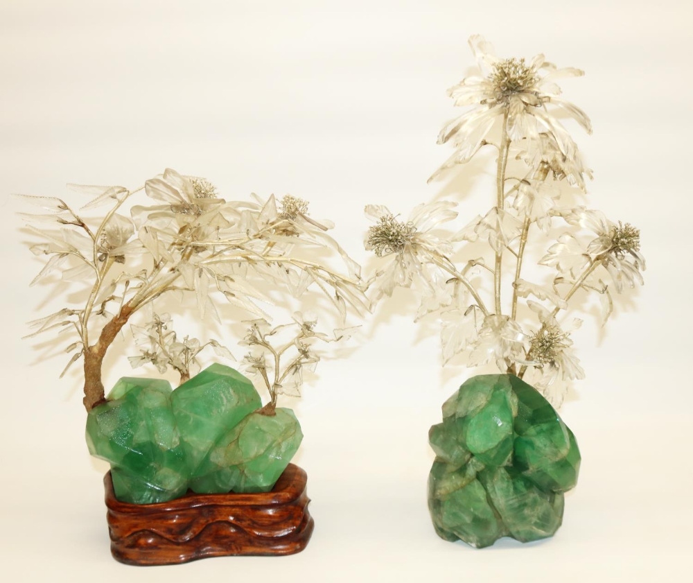 Two C20th polished quartz rock sculptures, wire branch work with glass leaves and beaded stamen, one