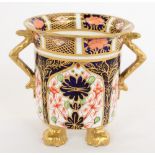 Early C20th Royal Crown Derby 1128 Imari pattern small vase with geometric handles, on four gilt paw