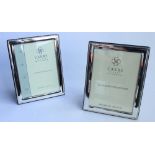 Pair of ER.II hallmarked silver rectangular photograph frames, by Carrs of Sheffield 2015, as new in