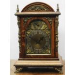 C20th ormolu mounted oak arched top bracket clock, brass dial with silvered Roman and fast/slow