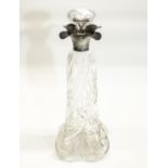 Edw.V11 hallmarked silver mounted decanter and stopper, wrythen tapering body decorated with