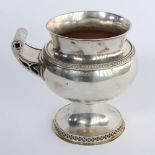 Geo.V hallmarked silver Communion vessel, single scroll handle pierced with gothic designs and