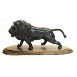 C20th Japanese patinated bronze model of a standing lion, with character mark, L30cm with wooden