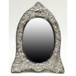 Victorian style ER.11 hallmarked silver easel mirror, oval plate in embossed scroll border with