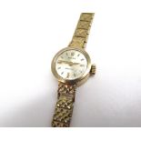 Ladies Rolex precision 9ct gold handwound wristwatch, signed silvered dial with applied baton hour